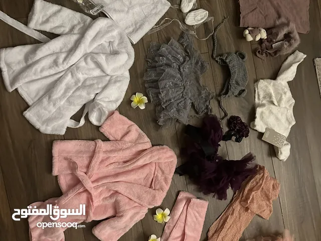 ملابس تصوير مواليد بنات
