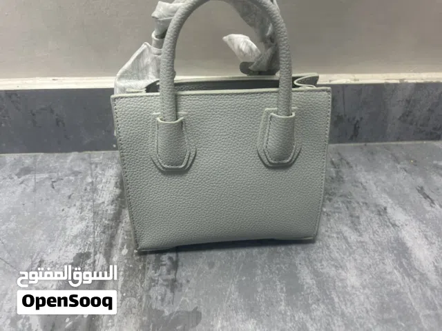 This purse cost 250. It is real not fake.