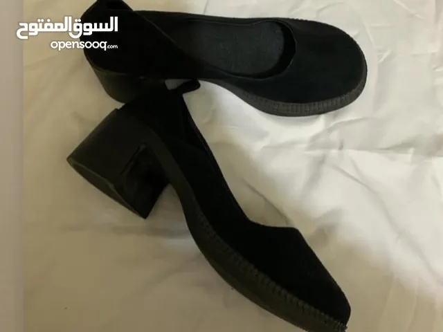 Black With Heels in Baghdad