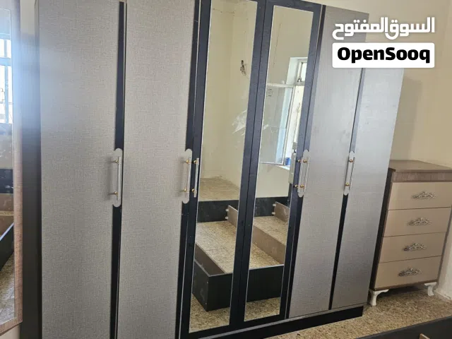 نجار عام فتح وشد غرف النوم والابواب والجراجيب-'
