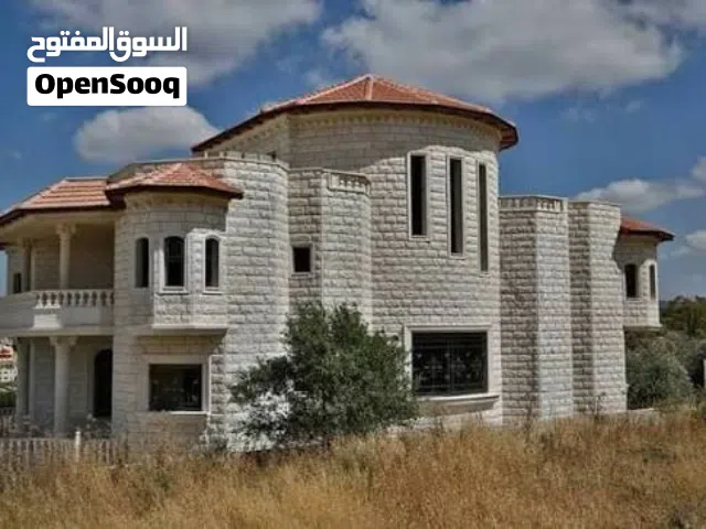 منزل مع ارض للبيع