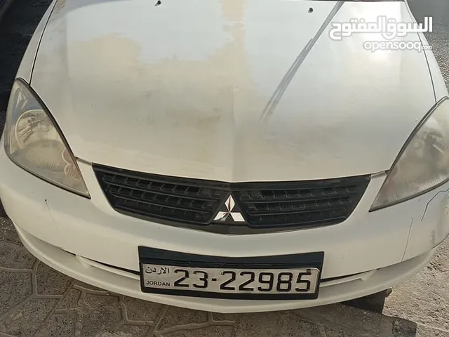 ميتسوبيشي لانسر للبيع بحاله ممتازه