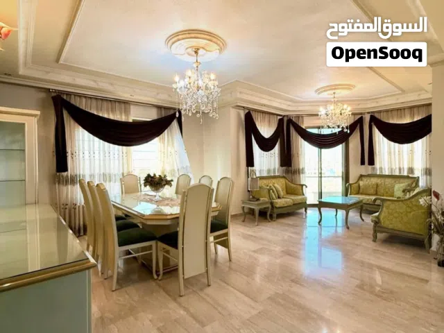 طاولة سفره مع بوفيه وخزانة وطقم كنب