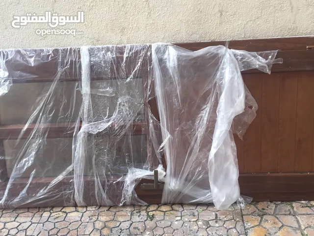 باب بي في سي وزجاج قهوي تركي كامل بالقفص متعه جديد حجم طول20'2 العرض90سانتي سعر650ديناررقم الهاتف