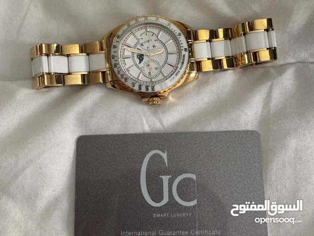 ساعه نوع GC لون ابيض وذهبي
