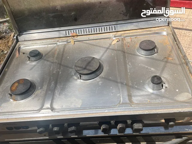 غاز يونيفرسال مع فرن 90 * 60 ستانلس ستيل مستعمل شغال 100٪ في الرمثا