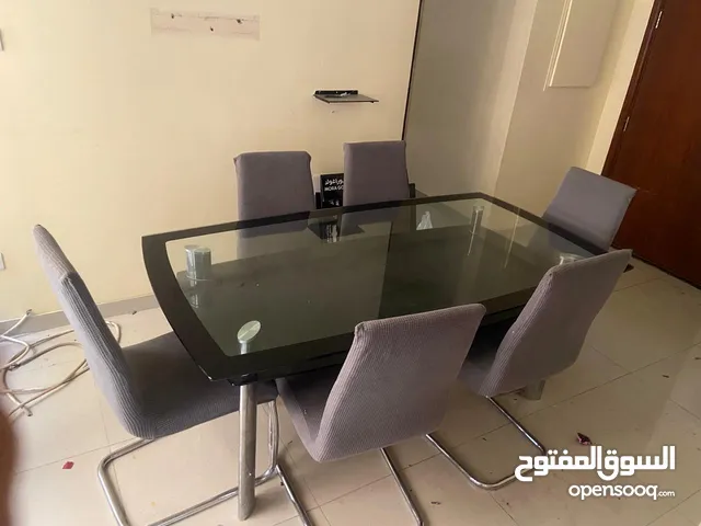 For Sale: Up To 8-Seater Glass Dining Table – Excellent Condition (Heavy Duty)