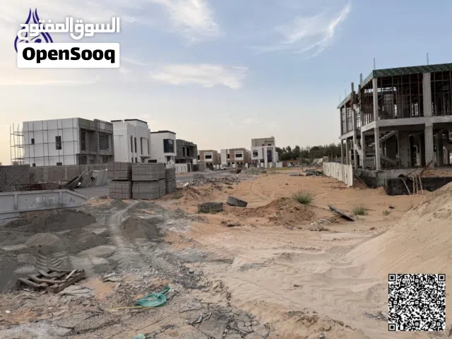 ارض تاون هاوس بمنطقة الزاهية بالقرب من شارع الشيخ محمد بن زايدTownhouse land in Al Zahya area,