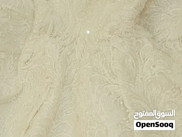 فستان عرس أبيض نفش تقيل