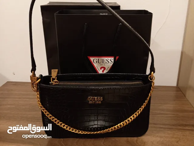 شنطه ميني جيس مع محفطه وساعه كلن لون اسود