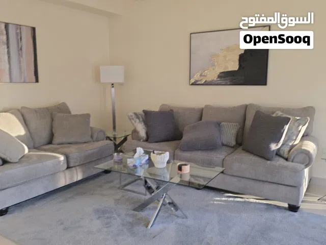 living sofa set 3+2 along with middle coffee table and to end coffee tables, lamp shade and carpet