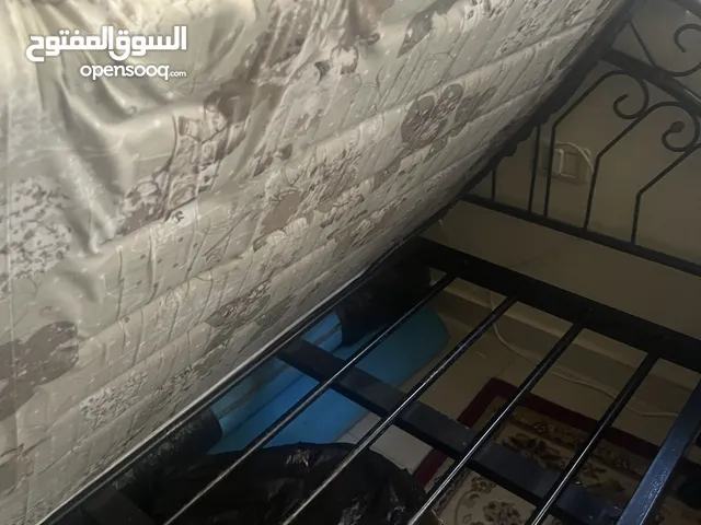 تخت حديد عدد(2) وكرسي