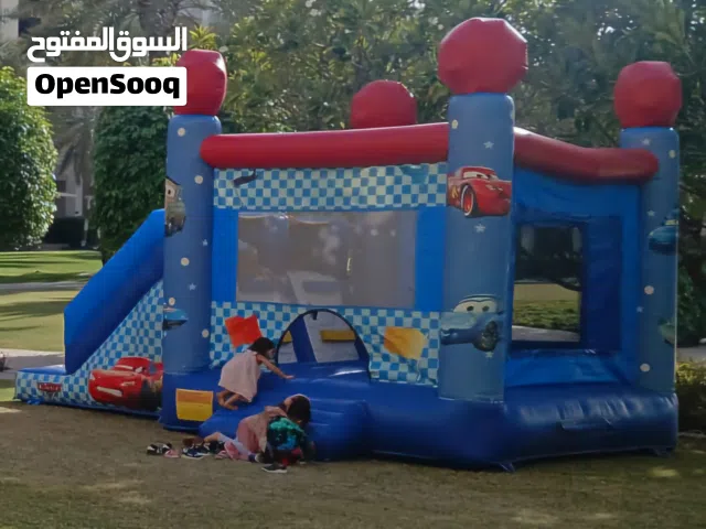 cars bouncing castle