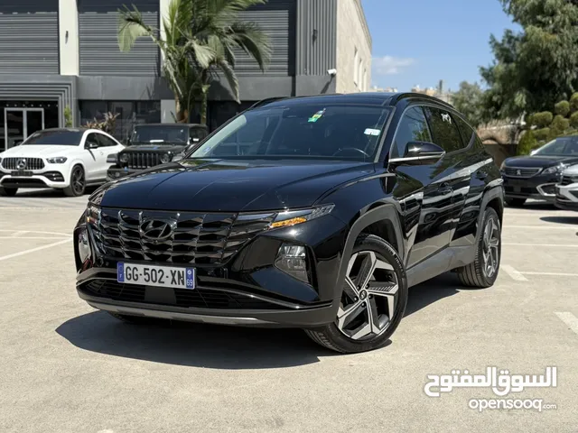 هونداي توسان ترخيص 2022 محرك 1600 هايبرد plug in/يقطع على الشحنه 65 كيلو متر