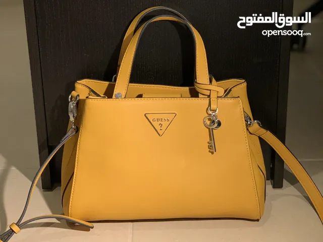 Yellow GUESS for sale  in Amman