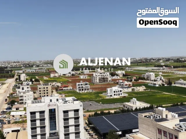 أرض مميزة للبيع الطنيب بجانب جامعة الشرق الاوسط حوض (4) العيادات مساحة 600 متر منطقة فلل فخمة