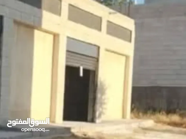 مخزنين ونص للبيع مقابلين
