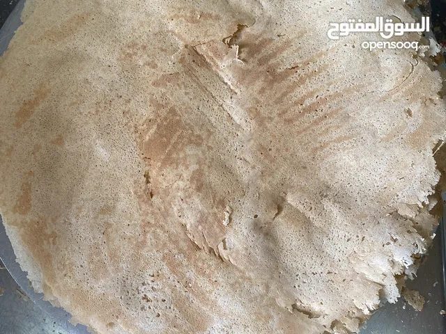 ( خبز عماني طازج )  مخبز شعبي فرع الخوض