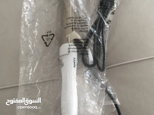 مكواة لتصفيف الشعر للبيع