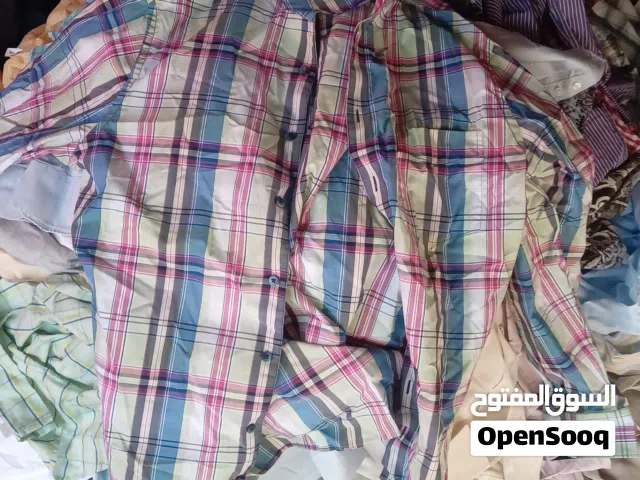 ملابس رجالي بولو قميص وملابس اطفال حديث الولاده اوربي مش ملبوس والجد مابقصر معو اشوال بسعر مغري