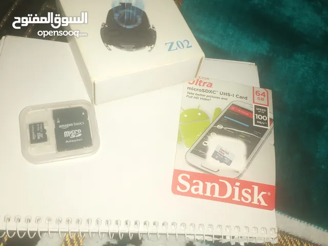 ميموري SanDisk 64GB وميموري Amazon basics و مروحة تبريد للهاتف