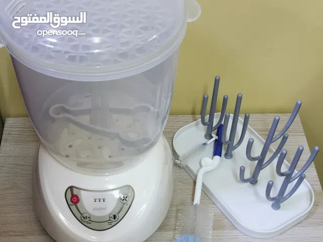 جهاز التعقيم والتجفيف لمستلزمات الأطفال