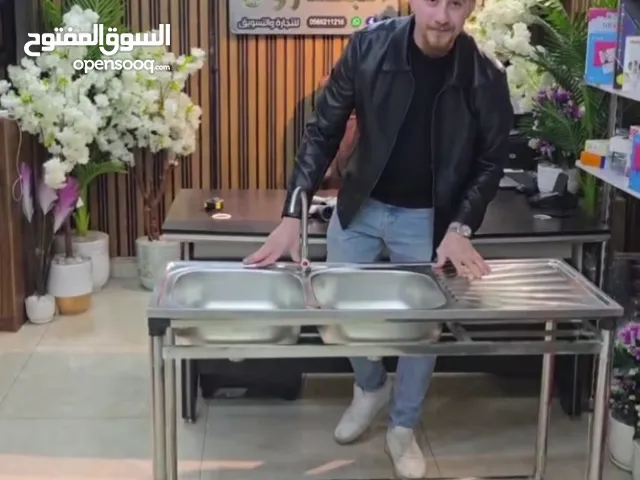 حوض ستانلس ستيل مزدوج مع ستاند كامل قوة، ترتيب، واعتمادية حوضين كبار لراحة وسرعة أثناء الغسيل .