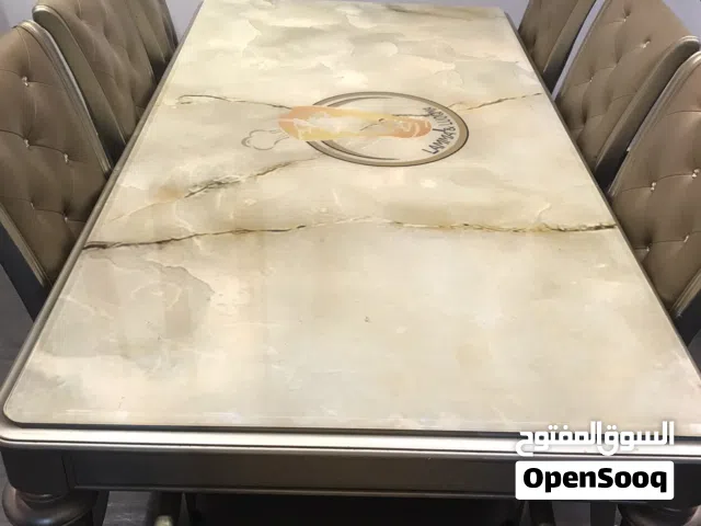 طاولة سفره  من سبع مقاعد