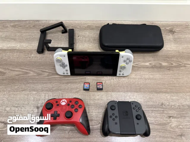 Nintendo Switch with case Mario controller extra joy-cons 128 GB micro SD card