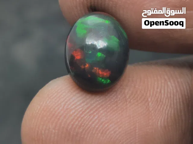 أوبال أثيوبي أسود طبيعي فل فاير مع اثبات فحص المختبر natural full fire Ethiopian opal stone