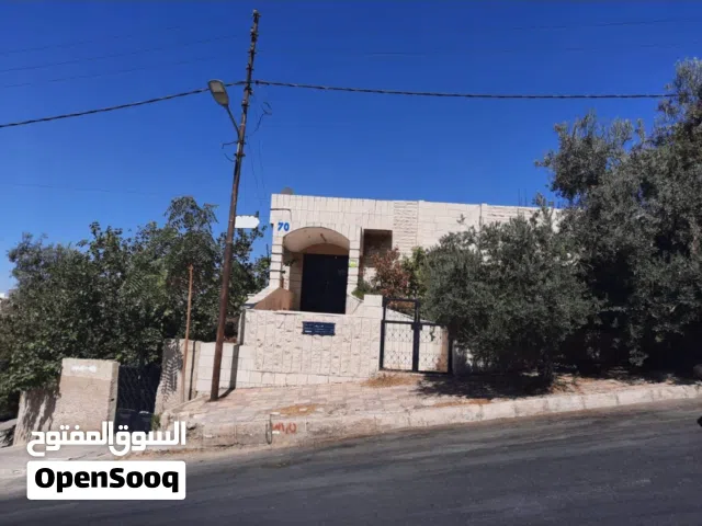 عمارة للبيع دور واحد على مساحة ارض 1100 على شارعين العمر 40 سنه صويلح حي الارسال