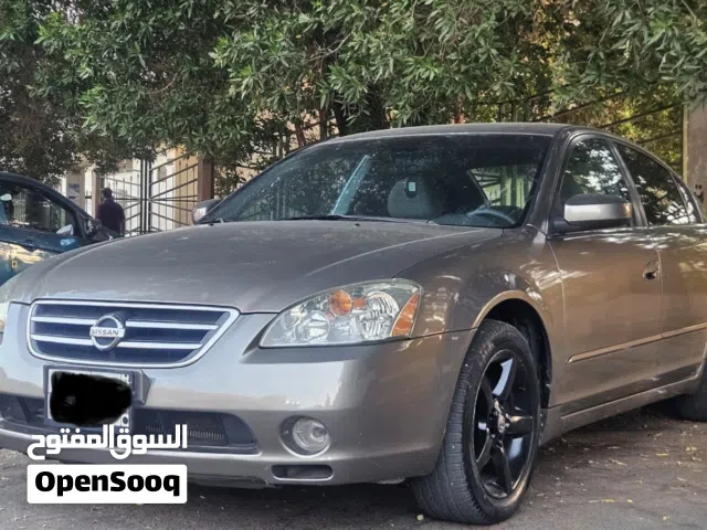 2006 نيسان التيما SL