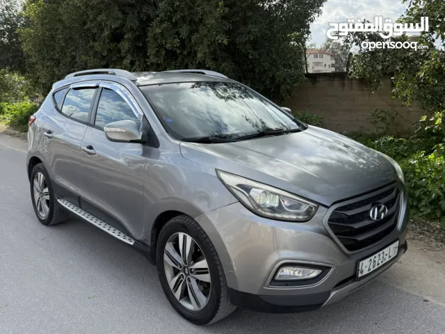 الاجمل والارقى توسان 2014 فل بدون فتحة 99%طلاءشركة ترخيص تامين شامل بصمة شاشة لون مميز فقط 65 كاش