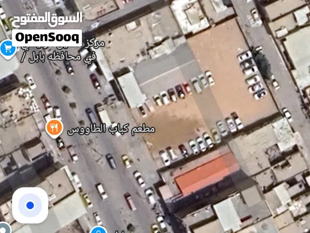 قطعة تجارية  وجهين  مركز الحلة