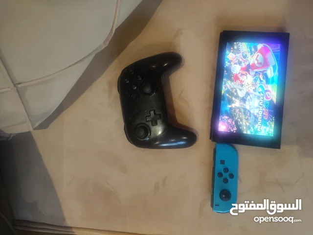 نينتيندو سويتش مستعمله بحالة جيدة ولعبة ويدين و كل الغراض