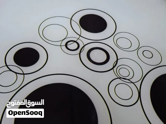 ميز طعام زجاجي