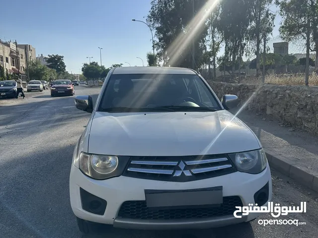 بكب l200 2015 double cab Mitsubishi
