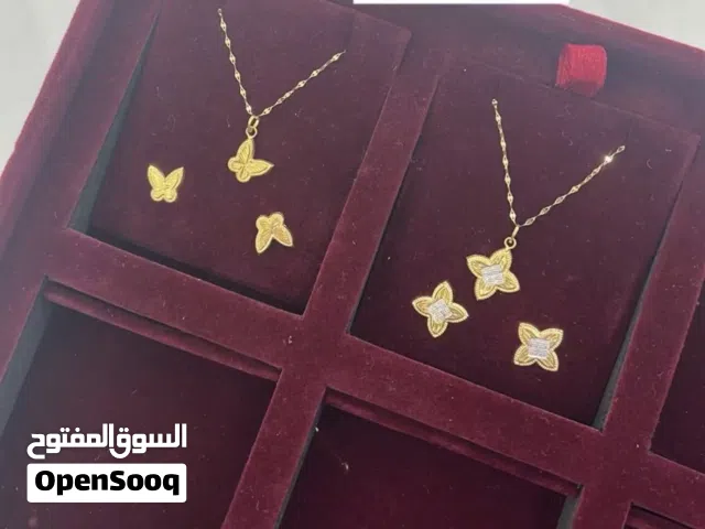 طقم و حلق ذهب