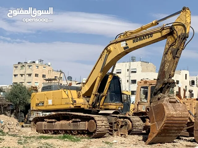حفارة كوماتسو 380-6 موديل 2000 تب نظافة و لودر كتربلر 970F للبيع