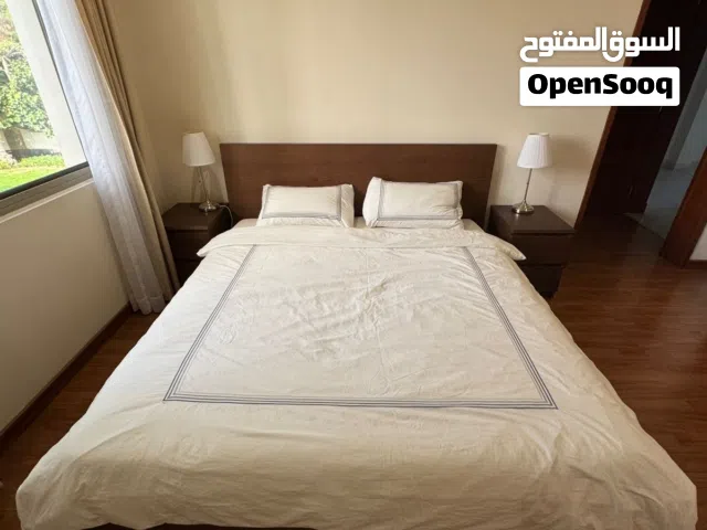 King Bed 200 *180 cm that includes 4 drawers, two drawers on each side with mattress for sale.