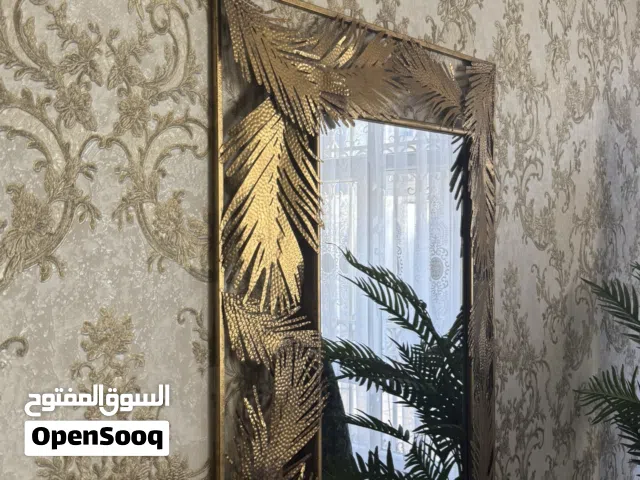 مرايا لون ذهبي مع برونزي