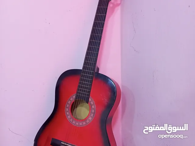 جيتار لون احمر للبيع بحالة جيدة