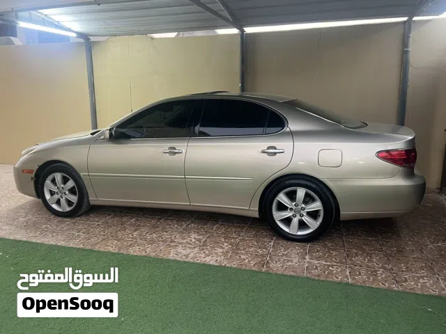 لبيع لكزس ES 300 موديل 2005 لون ذهبي بحالة ممتازة مع كافة المواصفات الأمريكية