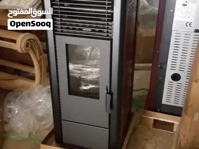 صوبة تعمل على بيليتس و هي عبارة عن حبيبات الخشب و تتكون من نجارة الخشب