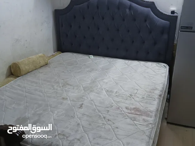 Bed with mattress and Wardrobe