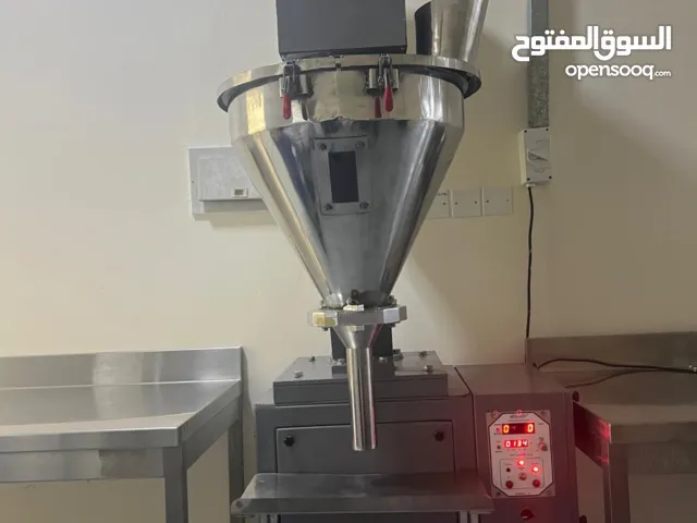 مكينة تعبئة للمواد الغذائية المطحونة