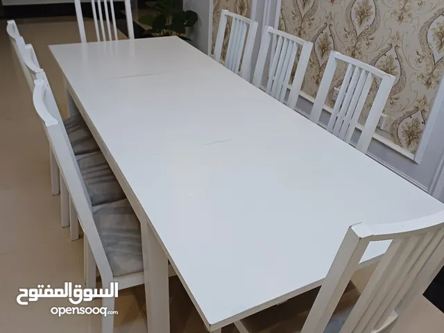 8-seater Ikea dining table طاولة طعام مع 8 كراسي