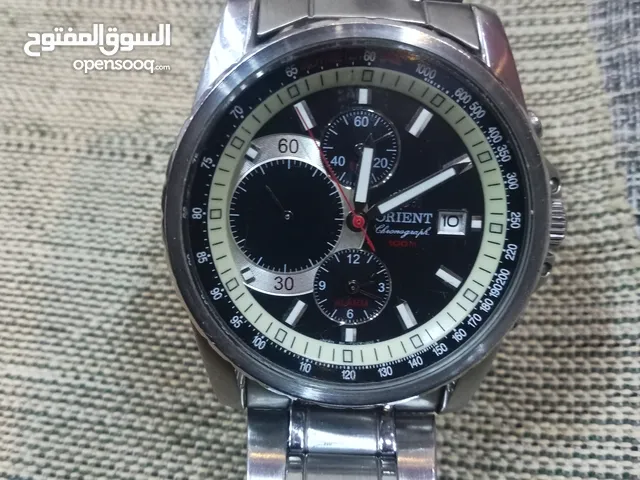 ساعة أورينت ياباني أصلي بحالة الوكالة ستوب ووتش إضاءة فسفوري تعمل على البطارية