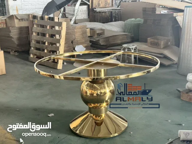 طاولات ستيل ذهبي