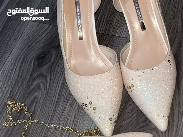 Gold With Heels in Tripoli